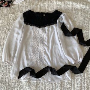 White blouse with lace black top